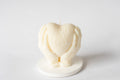 Heart in hands candle